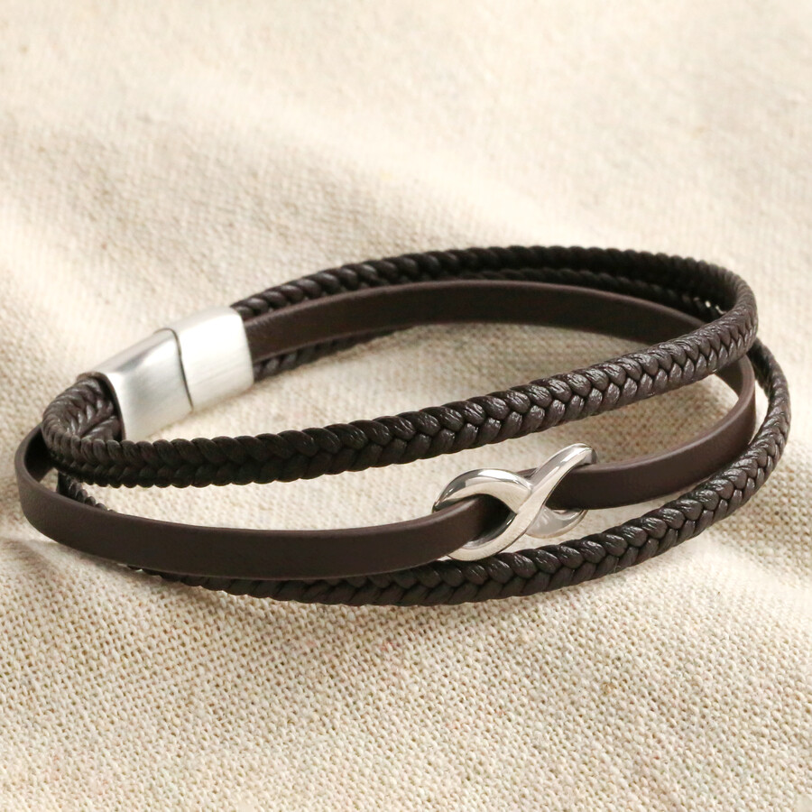 A Sleek Chocolate Brown Leather Strap Bracelet with Multiple Strands and a Silver Infinity Symbol Charm in the Centre