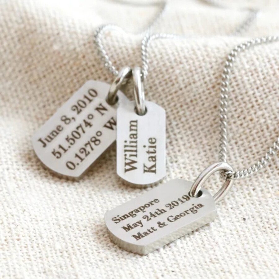A Dog Tag Pendant Necklace in Silver With an Engraved Message of Your Choice
