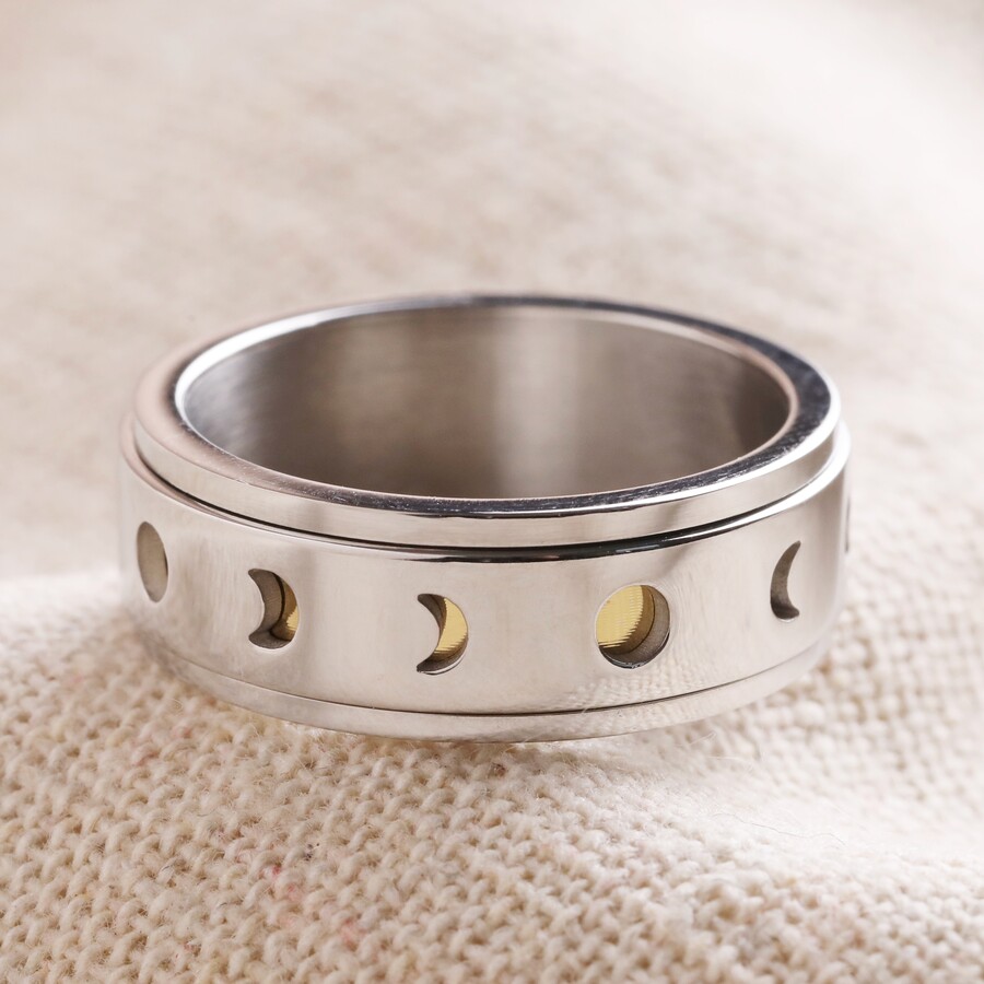 A Spinning Fidget Ring with a Moon Phase Design Ideal for Fidgeting Dads who Also Adore Accessorising