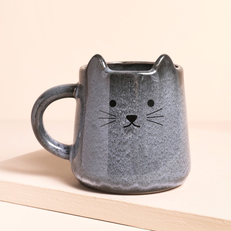 Place a sweet cat themed mug into their boo basket for a fun surprise they can get a lot of use out of
