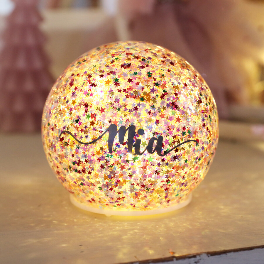 A Glittery Globe Light With a Name Added is Ideal for Gifting to a Teenage Girl Upgrading Her Bedroom