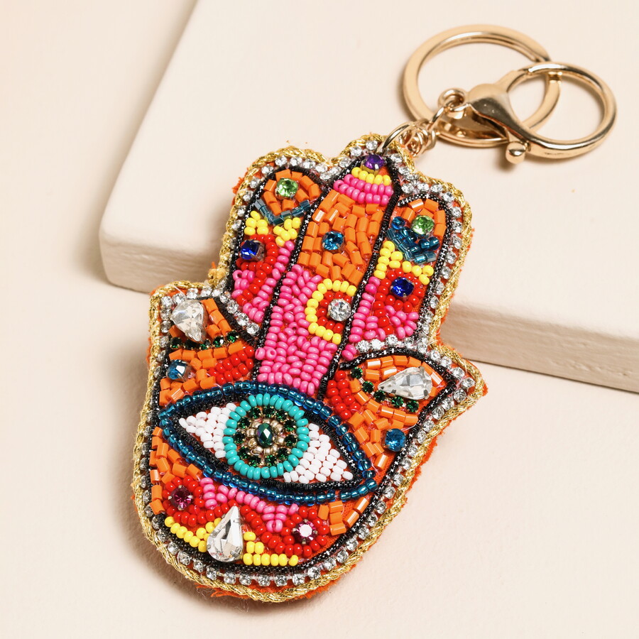 This Colourful Hamsa Keyring is Perfect for Adding Colour and Fun to a Functional Festival Accessory Like a Tote Bag