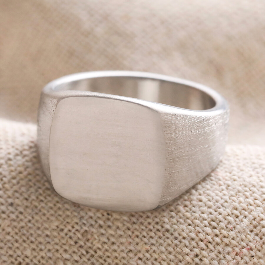 Adding a statement ring like this signet ring is perfect for a more masculine energy to a unisex jewellery look