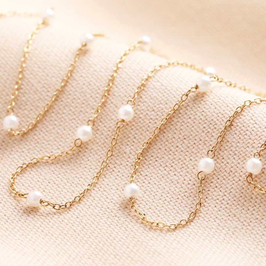 A Dainty Chain Necklace with Tiny Pearls is Perfect for More Laidback and Subtle Bridal Looks