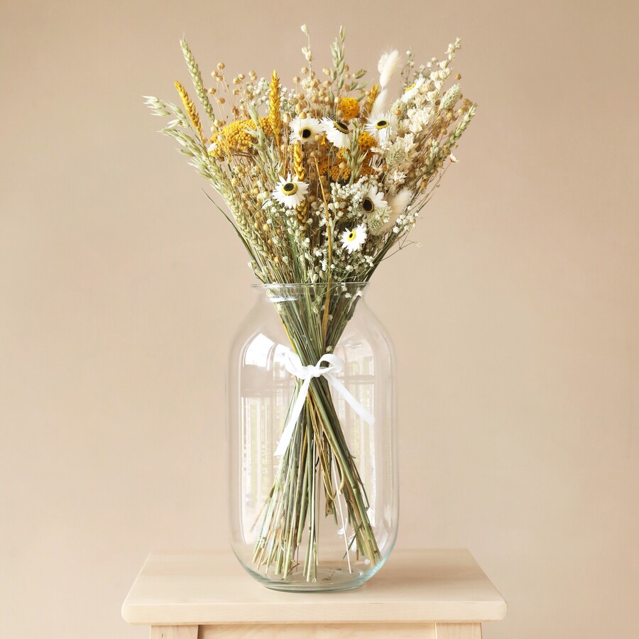Large Rounded Glass Vase with flowers inside