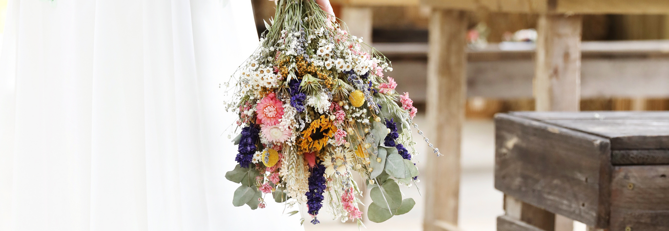 Bride Holding a Dried Flower Bouquet on Wedding Day