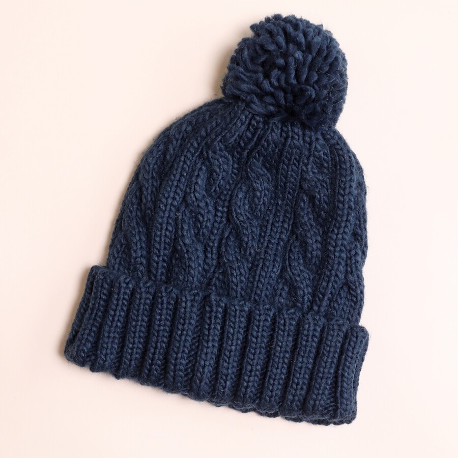 A Cosy Accessory Like This Bobble Hat is Ideal for Gifting to a Son for Christmas