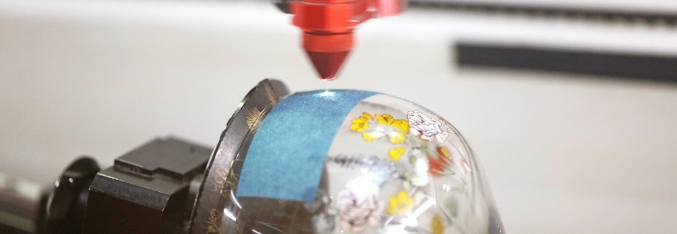 Personalised Gin Glass Being Rotary Engraved