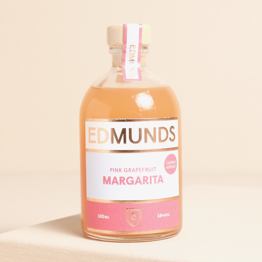 A Small Glass Bottle of Pink Grapefruit Margarita Cocktail