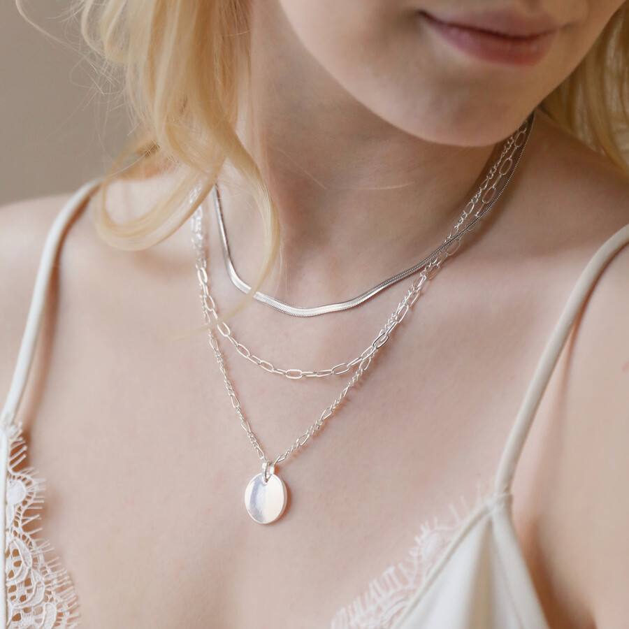 Herringbone Chain in Silver on model with curated look