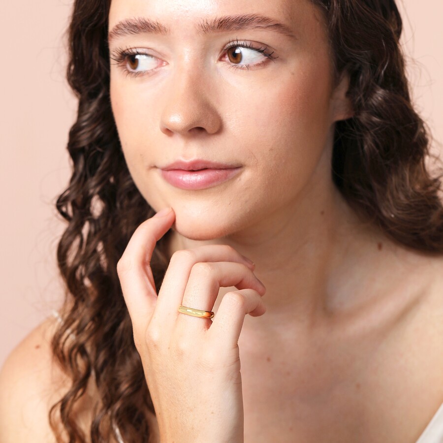 Brunette Model Wearing Gold Ring from Lisa Angel Women's Rings Collection