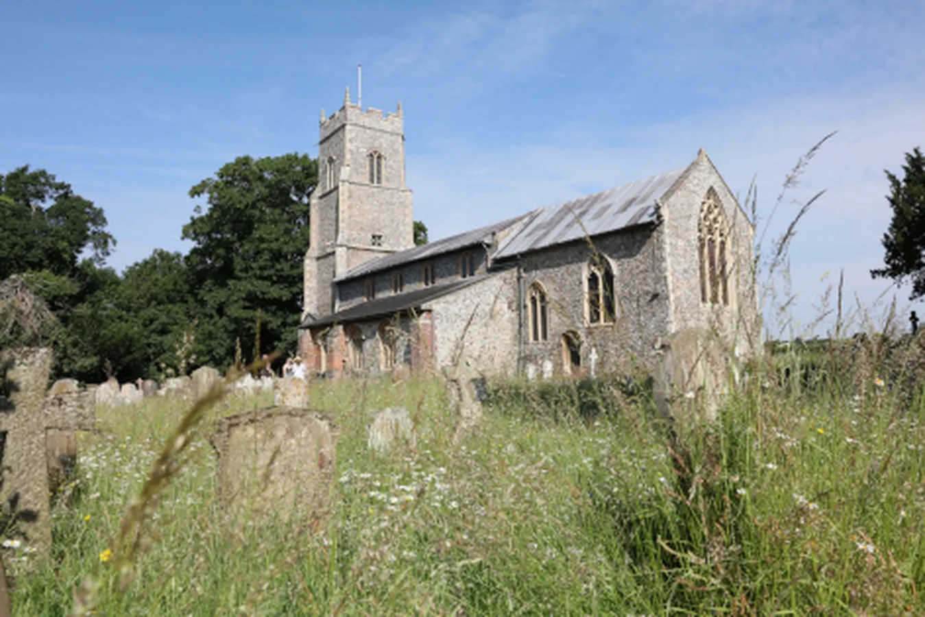 wildflowers with saint mary's church in background
