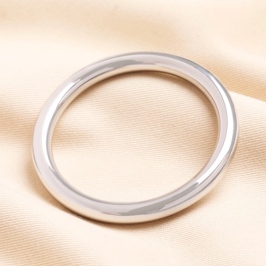 Style a Simple Sleek Bangle With Chunky Jumpers or Office Attire to Look Chic and Put Together Just Like Miranda Priestley