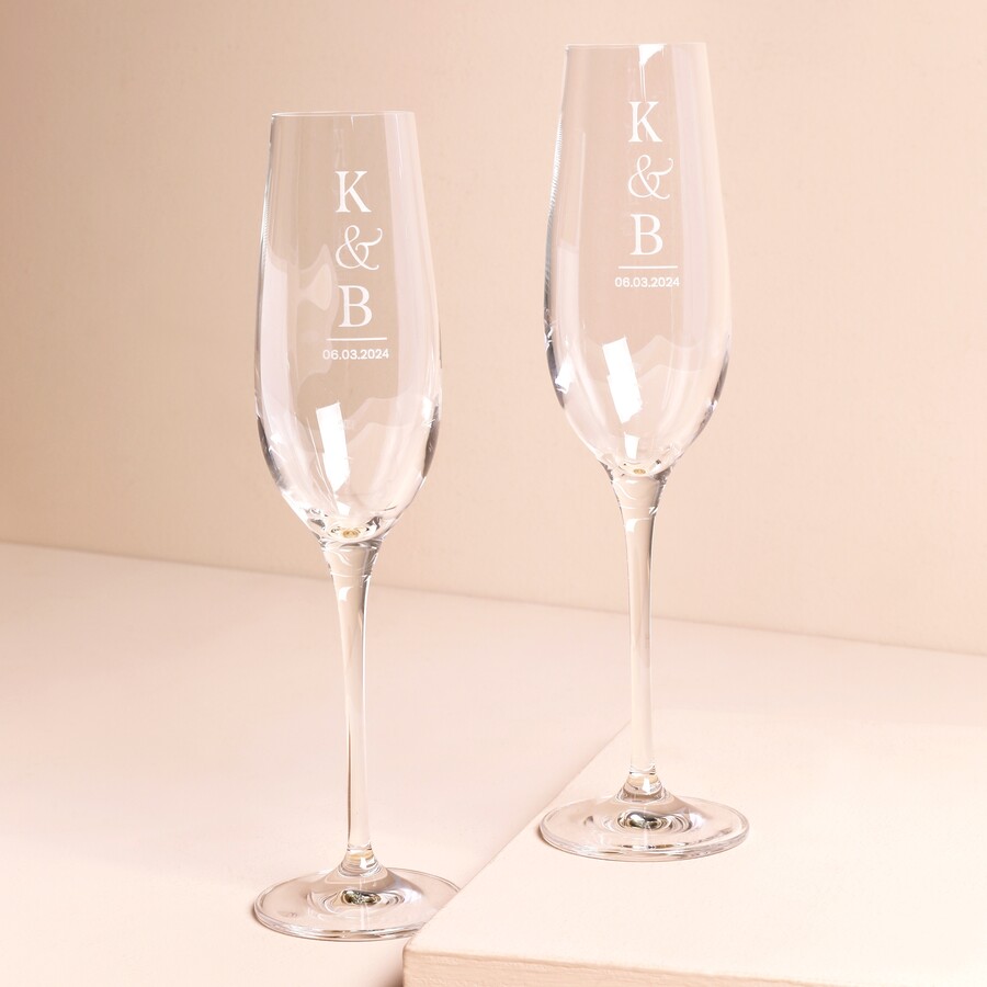 This Set of 2 Personalised Wedding Initial Champagne Glasses is the Perfect Gift for a Newly Engaged Couple