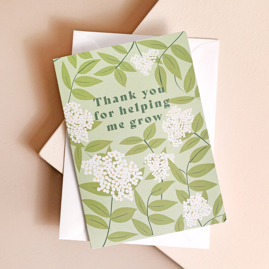 A Sage Green Greetings Card with a Floral Print and a Meaningful Message in the Centre, Complete with a White Envelope