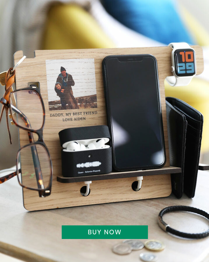 wooden personalised accessory stand on a dark wooden table