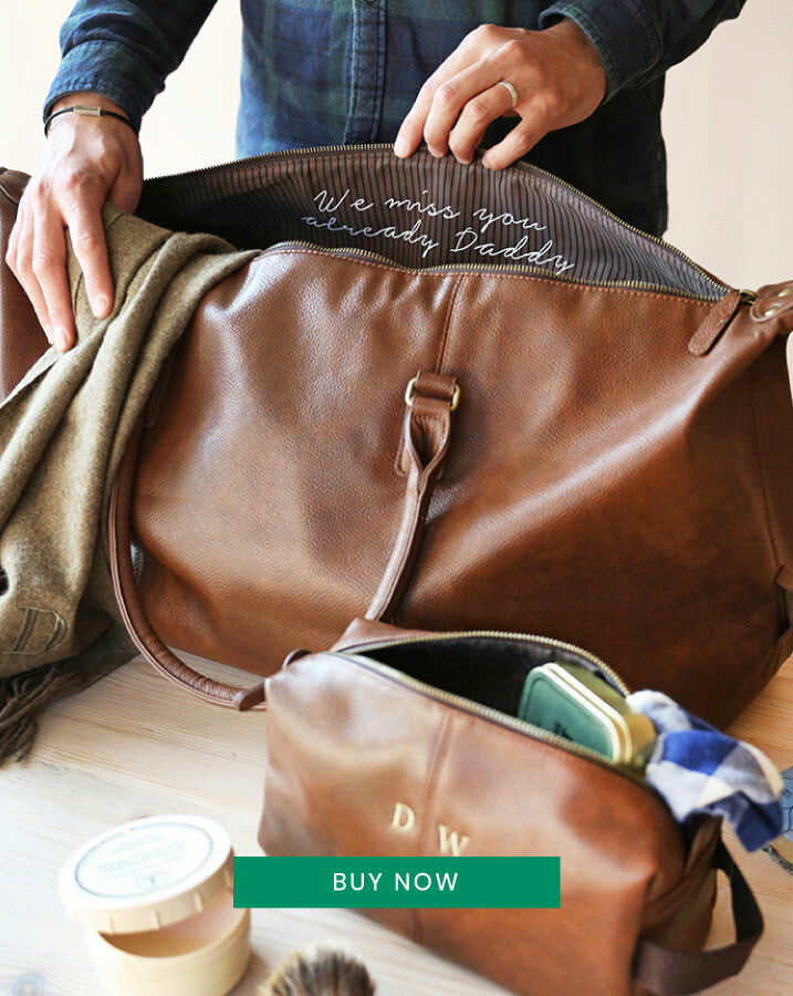 personalised hidden message weekend holdall on wooden table