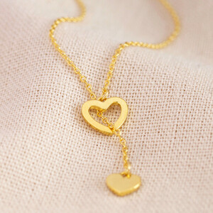 Mismatched Heart Laryat necklace in gold