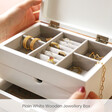 inside of white jewellery box with drawers