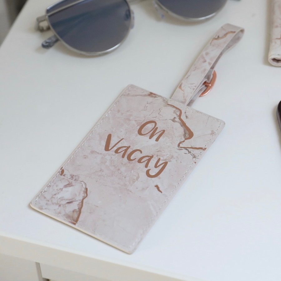 on vacay luggage rose gold