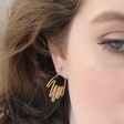Gold Hand Hoop Earrings on Model