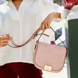 Women's Personalised Engraved Blush Pink Suede Crossbody Handbag on Model