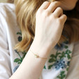 Crystal Daisy Charm Bracelet in Gold on Model