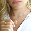 Model Wearing Lisa Angel Ladies' Hammered Initial and Birthstone Charm Necklace in Gold