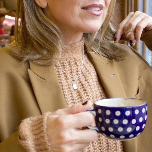 Tiny Hammered Tag Pendant Necklace in Silver on Model