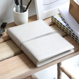 Grey Vegan Leather Refillable Notebook on Wooden Bench