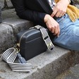 Lisa Angel Ladies' Personalised Embriodered Black Leather Crossbody Bag with Black and White Striped Strap on Model