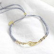 Lisa Angel Delicate Gold Wing and Grey Cord Bracelet