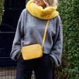 Women's Rectangular Crossbody Bag in Mustard on Model