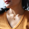 Interlocking Stars Pendant Necklace in Gold on Model