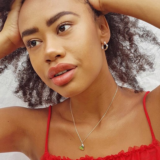 Silver Puffed Heart Pendant Necklace on Model