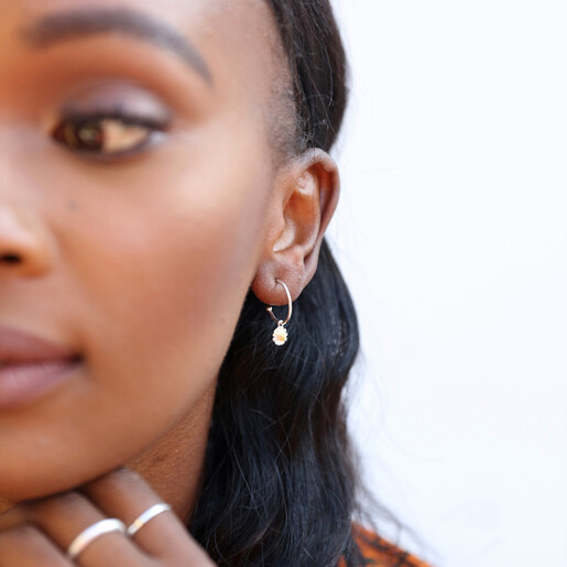 Girls Estella Bartlett Daisy Charm Hoop Earrings in Silver on Model