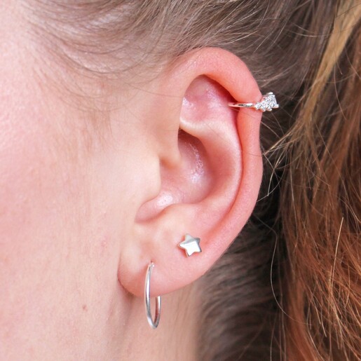 Puffed Star Stud Earrings on Model