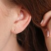 Tiny Sterling Silver Crystal Stud Earrings on Model