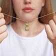 Gold 'The Sun' Tarot Card Pendant Necklace on Model