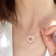 Lisa Angel Ladies' Organic Finish Heart Necklace in Silver on Model