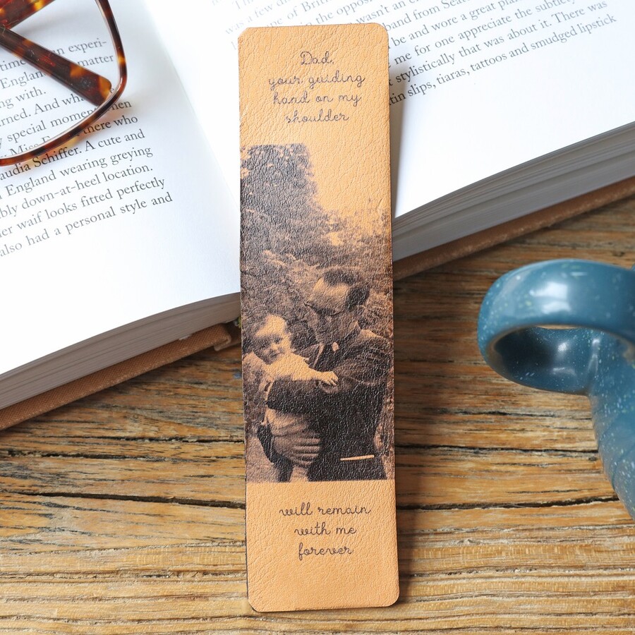 Personalised Photo Leather Bookmark in lifestyle shot against open book