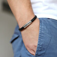 Men's Engraved Black Woven Bracelet with Magnetic Clasp on Model