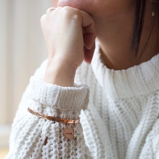 Rose Gold Personalised 'Be Brave' Meaningful Word Bangle on Model