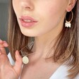 Ladies' Triple Shell Charm Hoop Earrings in Gold on Model