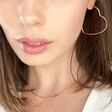 Large Heart Hoop Earrings in Rose Gold on Model