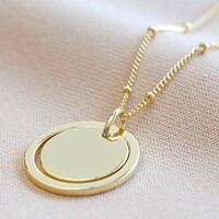 Ring and Disc Pendant Necklace in Gold