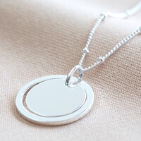 Ring and Disc Pendant Necklace in Silver