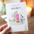 Model Holding Enjoy Your New Home Greeting Card