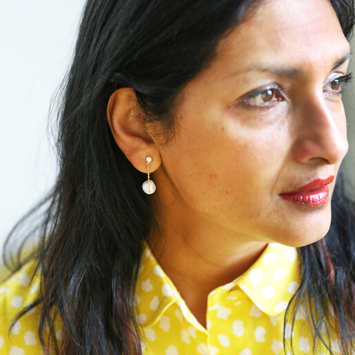 Model Wears Freshwater Pearl and Chain Drop Earrings in Gold