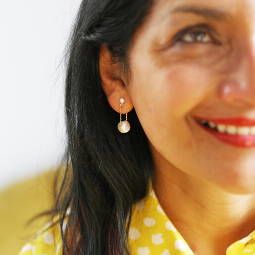 Freshwater Pearl and Chain Drop Earrings in Gold on Model
